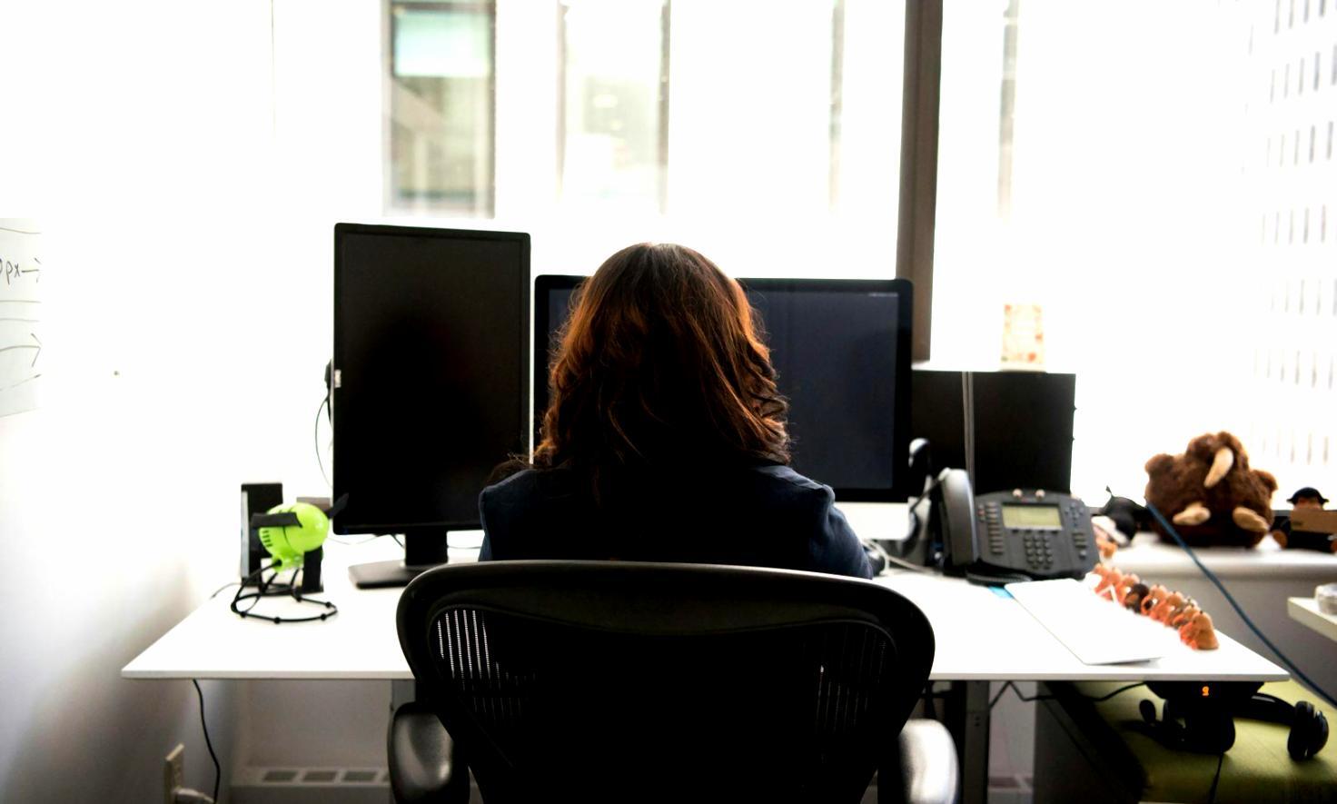 Team collaborating on financial technology solutions in modern workspace